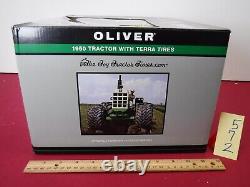 Oliver 1950 with Terre Tires 1/16 Diecast Farm Tractor Replica by Spec Cast