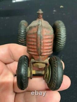 Vintage Arcade Cast Iron Balloon Tire Tractor and Driver Toy Farm Feed Seed